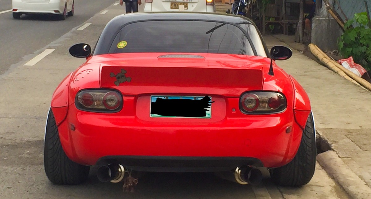 This spoiler only fits the NC WITH PRHT (Power Retractable Hard Top). 