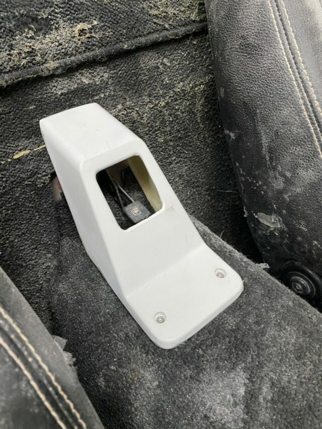 Upgrade Your Miata NA with a Sleek Carbon Fiber Trunk Lever Cover