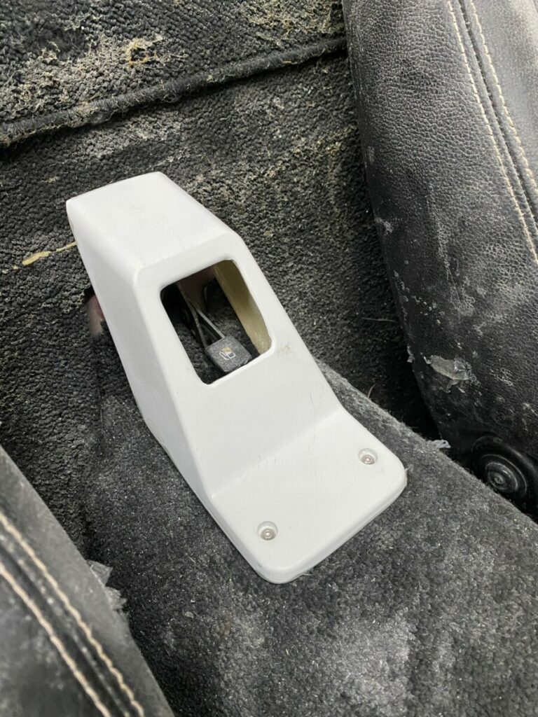 Upgrade Your Miata NA with a Sleek Carbon Fiber Trunk Lever Cover